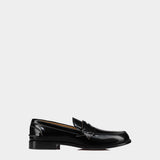 CHRISTIAN LOUBOUTIN Penny loafers in black shiny calfskin 