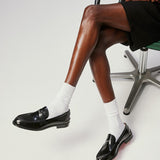 CHRISTIAN LOUBOUTIN Penny loafers in black shiny calfskin 